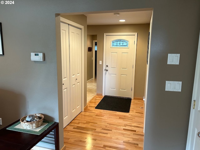 foyer entrance featuring light wood-type flooring