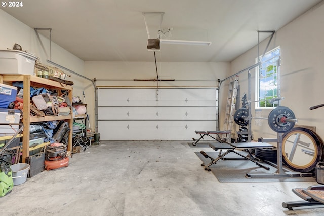 garage featuring a garage door opener