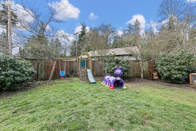 view of yard featuring a fenced backyard and a playground