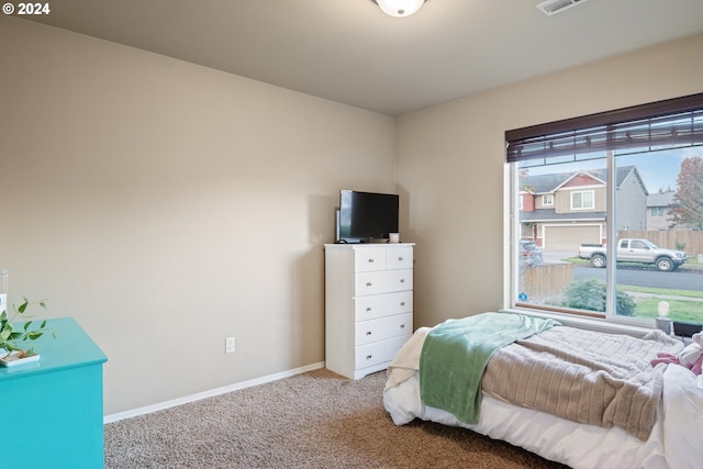 bedroom featuring carpet flooring