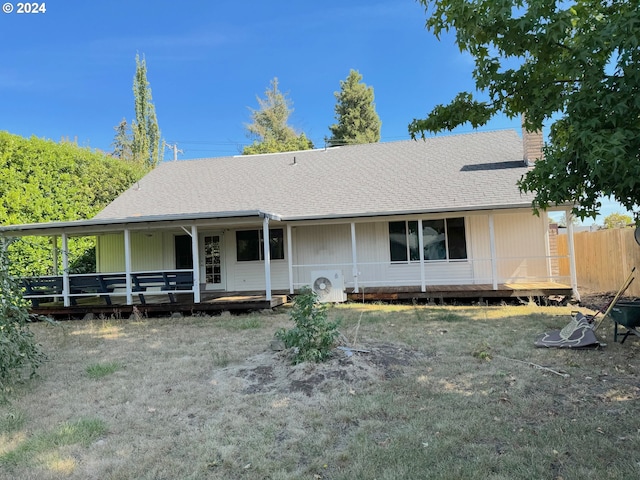 view of front of home featuring ac unit