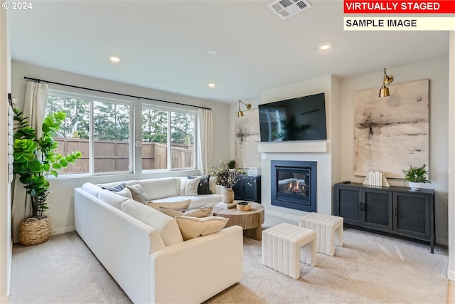 living room with light carpet