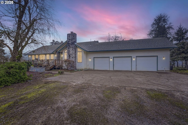 view of front of property with a garage