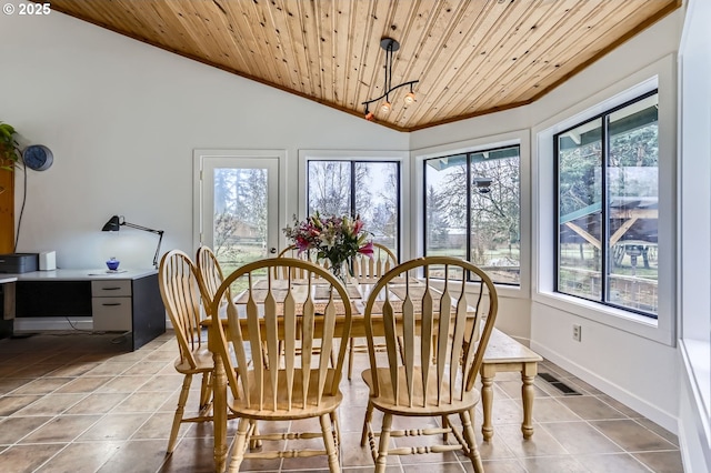 dining room featuring wood ceiling, light tile patterned flooring, and a chandelier