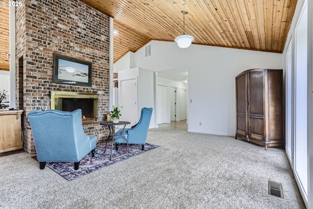 living room featuring high vaulted ceiling, a fireplace, light carpet, and wood ceiling