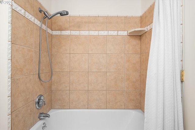 interior space with shower / tub combo with curtain