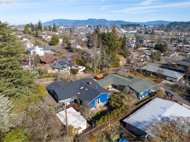 birds eye view of property featuring a mountain view