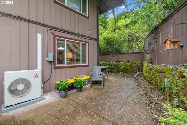 doorway to property featuring a patio area