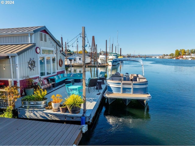 view of dock with a water view