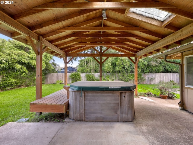 view of patio featuring a gazebo and a hot tub