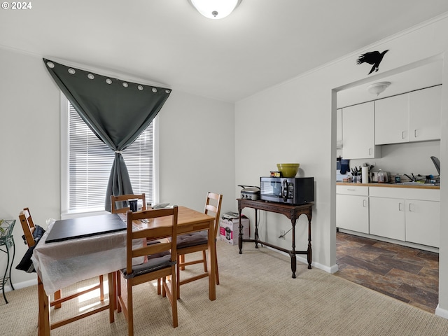 dining area featuring sink