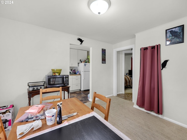 office space with crown molding and carpet floors