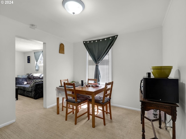 view of carpeted dining space