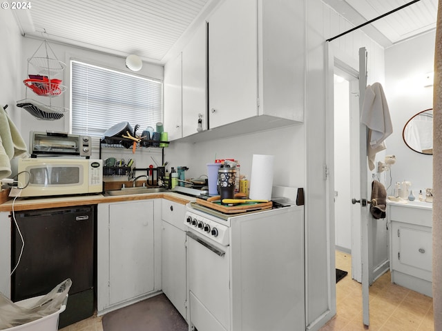 kitchen with white appliances and white cabinets