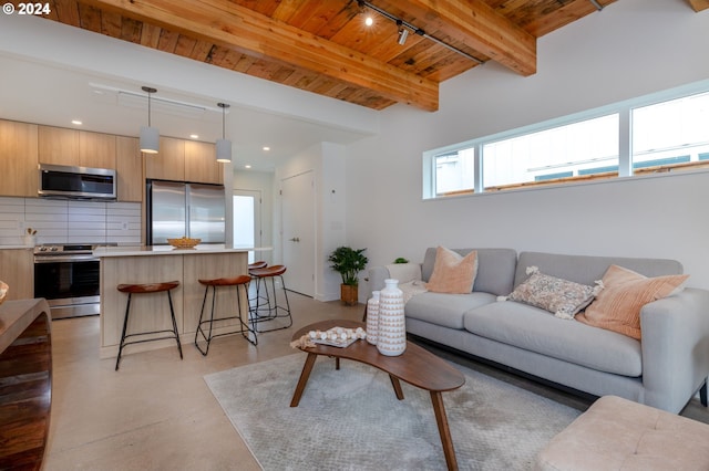 living room featuring beam ceiling and wooden ceiling