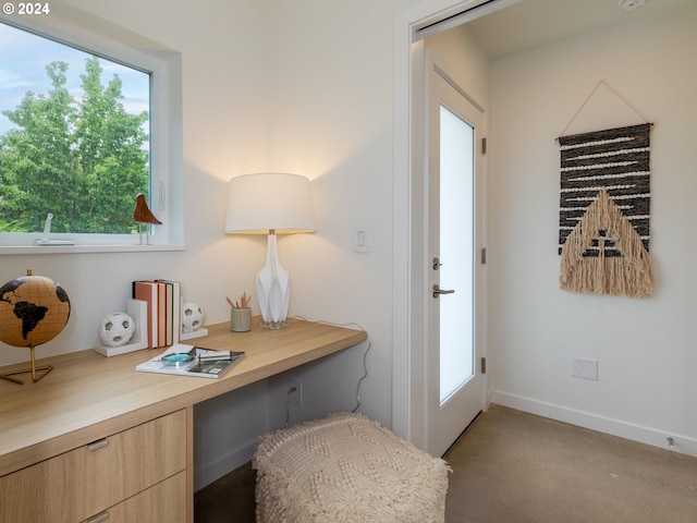 entryway featuring built in desk