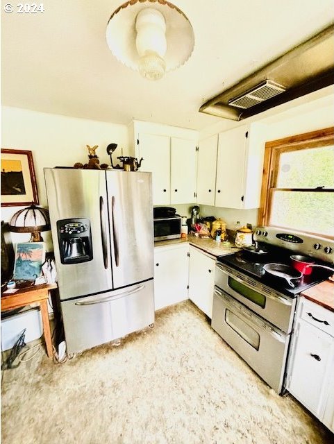 kitchen with white cabinets and stainless steel appliances