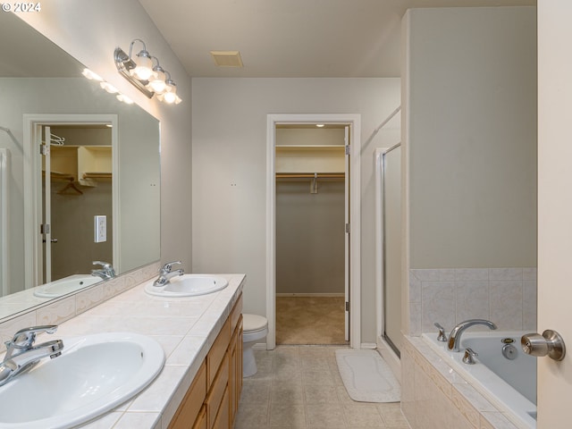 full bathroom with separate shower and tub, tile patterned flooring, vanity, and toilet