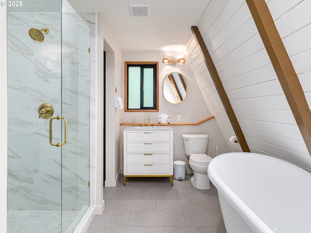 full bathroom with tile patterned flooring, vanity, separate shower and tub, and toilet