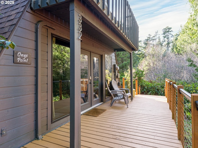 wooden terrace featuring french doors