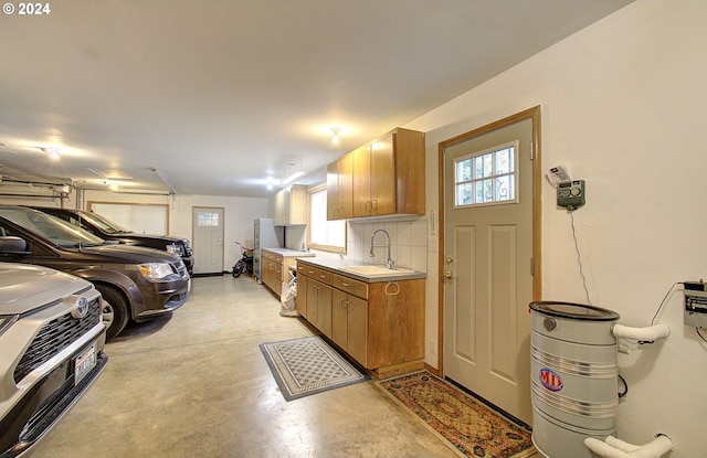 kitchen with decorative backsplash and sink