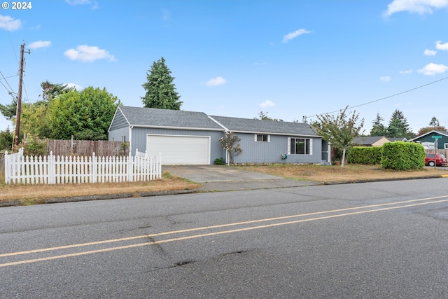 ranch-style home with a garage