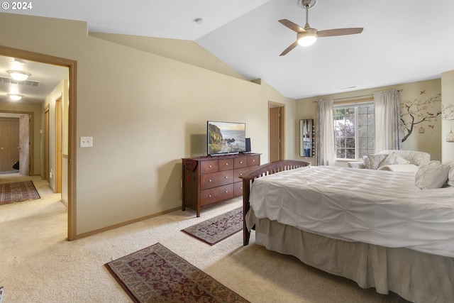 carpeted bedroom with lofted ceiling and ceiling fan