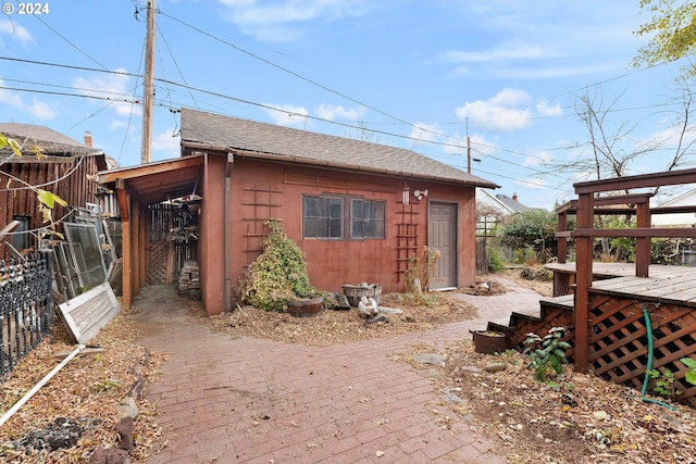 view of home's exterior featuring a deck