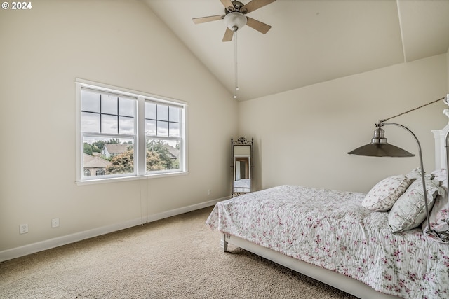 bedroom with high vaulted ceiling, ceiling fan, and light colored carpet