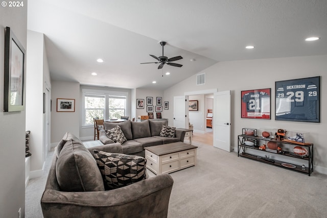 carpeted living room featuring lofted ceiling and ceiling fan