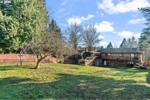 view of yard with a wooden deck