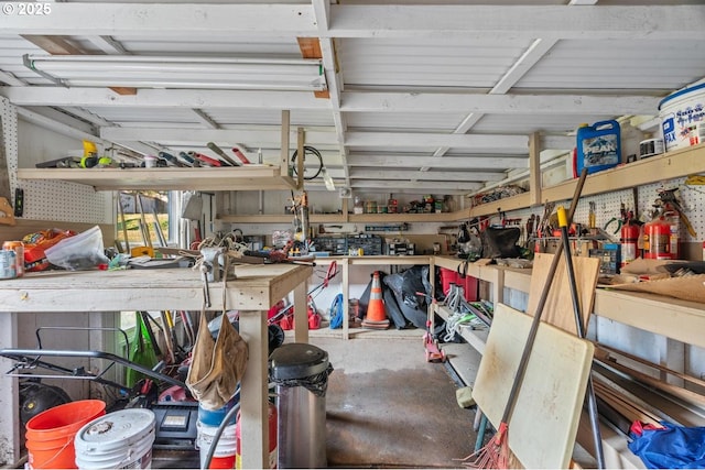 garage with a workshop area