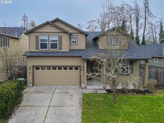 view of front of home with a garage, fence, driveway, roof with shingles, and a front lawn