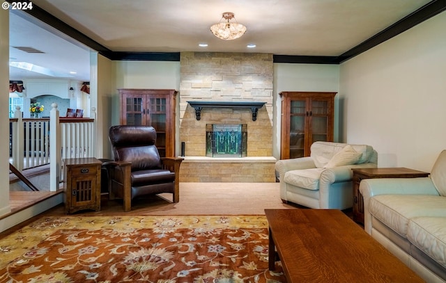 living area featuring carpet floors, crown molding, and a stone fireplace