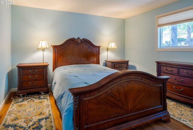 bedroom with light wood-type flooring