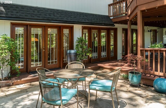 view of patio with french doors and a wooden deck