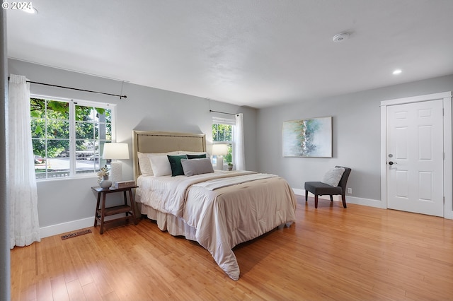 bedroom featuring light hardwood / wood-style floors