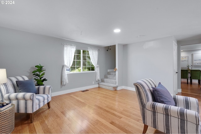 sitting room with light wood-type flooring