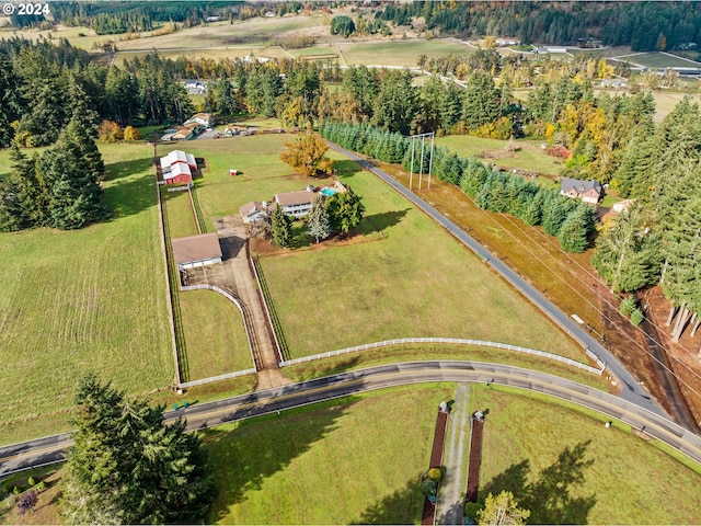 birds eye view of property featuring a rural view