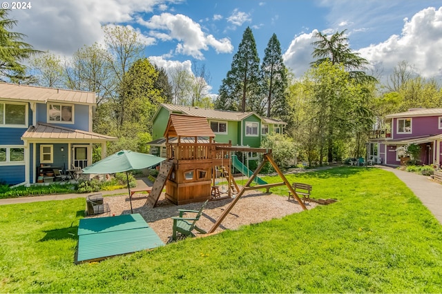 view of play area featuring a yard