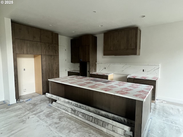 kitchen with dark brown cabinets