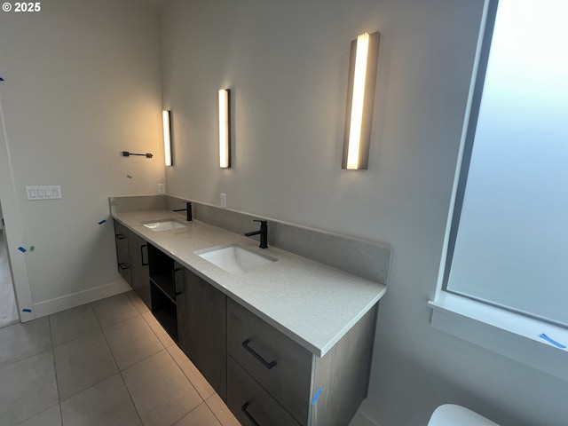 bathroom featuring vanity and tile patterned flooring