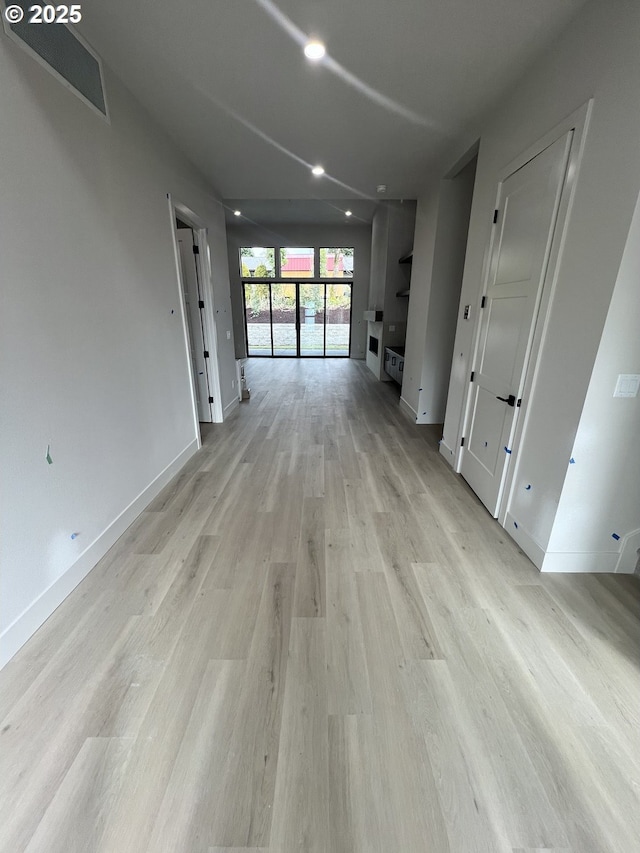 hall featuring light wood-type flooring