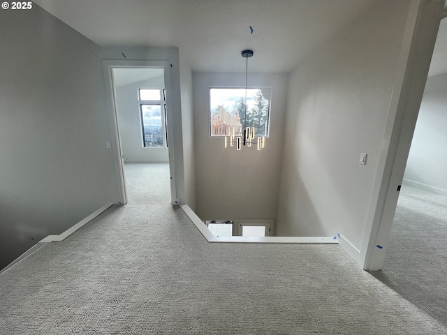 corridor with carpet floors