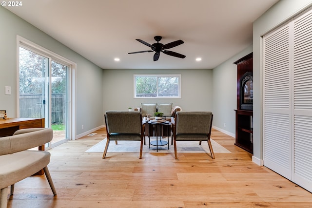 dining space with light wood-style flooring, recessed lighting, baseboards, and a wealth of natural light