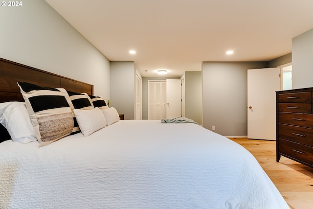 bedroom featuring recessed lighting and light wood-style floors