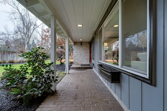 view of patio / terrace featuring fence