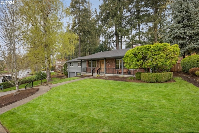 view of front of house featuring a porch and a front yard