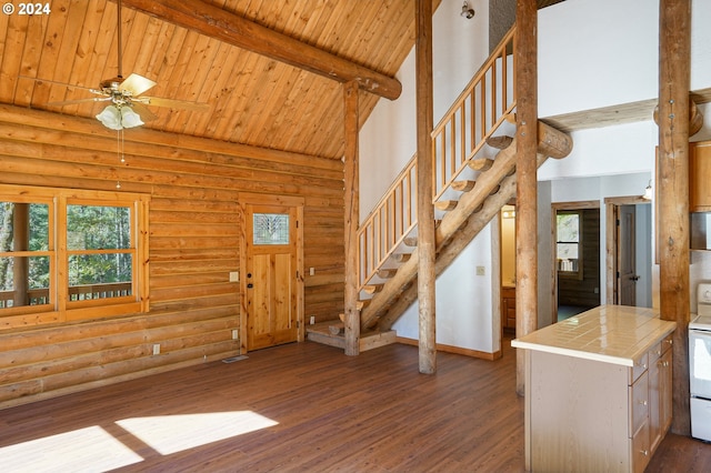 23835 Greasy Creek Rd, Philomath, OR 97370 - foyer entrance with wooden ceiling with exposed beams, high vaulted ceiling, log walls, wood finished floors, and stairs