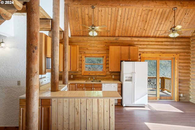 23835 Greasy Creek Rd, Philomath, OR 97370 - kitchen with white appliances, rustic walls, ceiling fan, healthy amount of natural light, and a peninsula